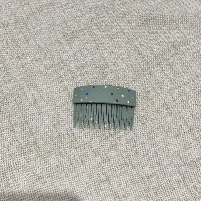 绿色带钻发梳