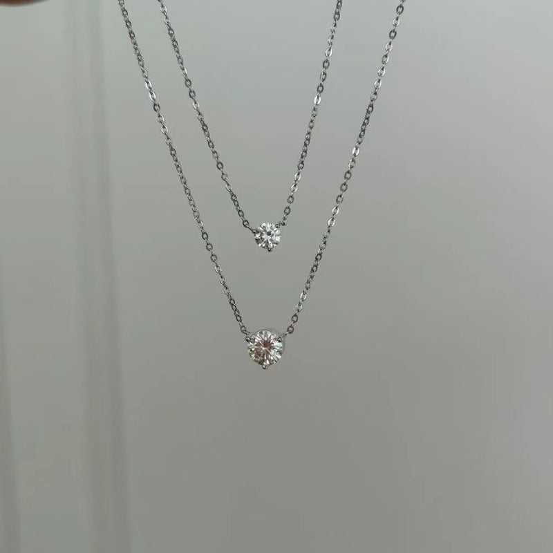 A sophisticated and stylish adjustable necklace set with a single diamond and sterling silver S925 white round zircon.