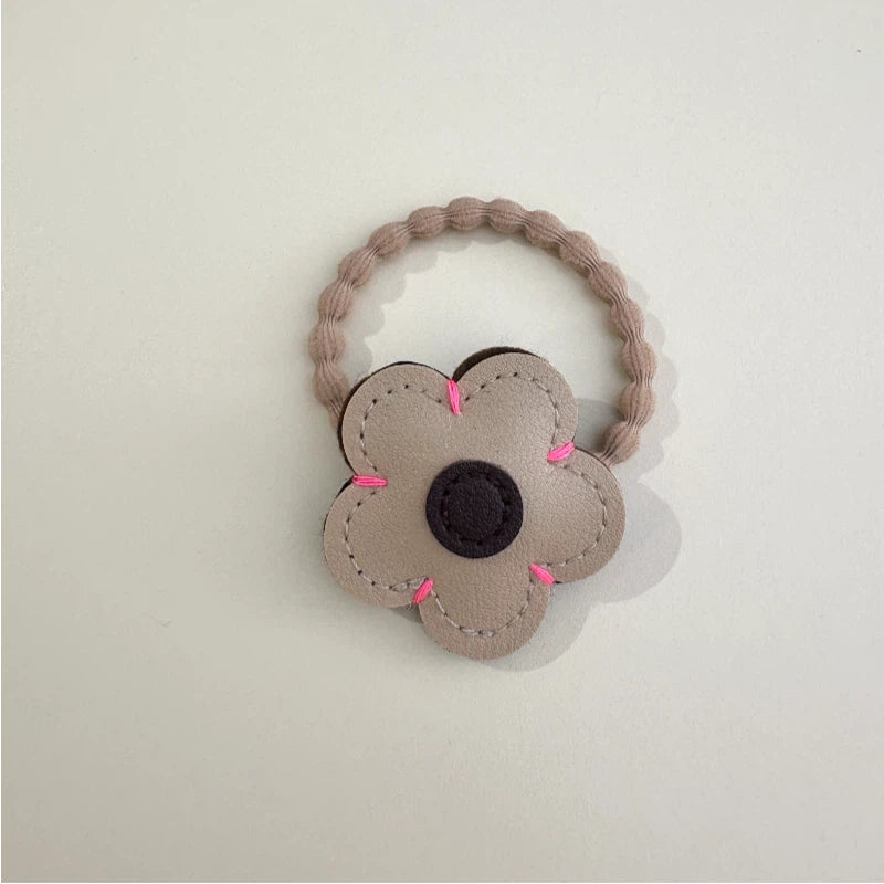 Candy-colored flower hair tie
